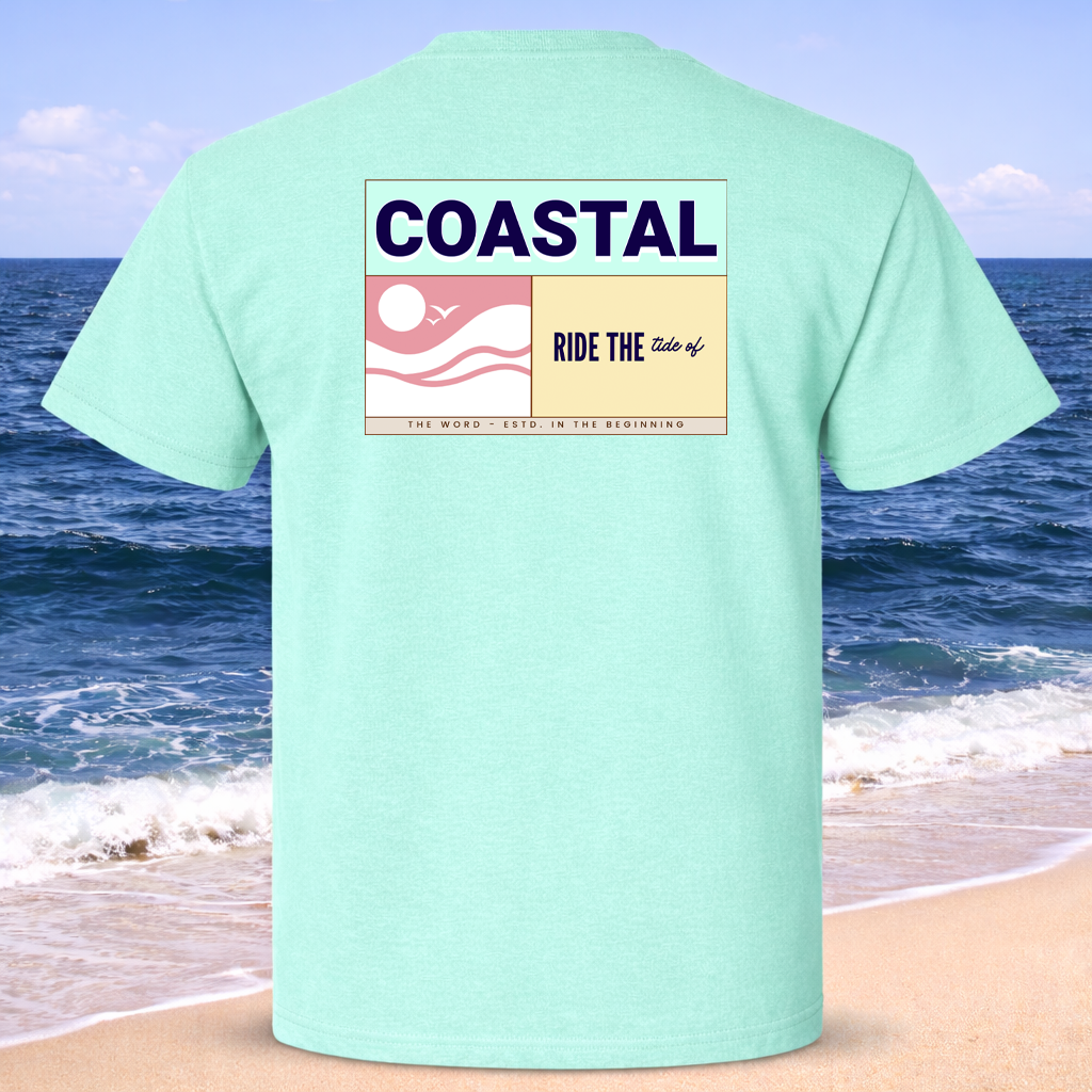Light blue t-shirt with 'Coastal' graphic on a beach