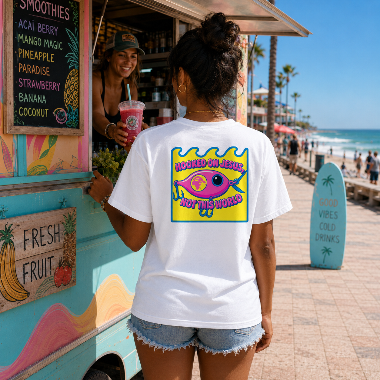 Female model wearing a white Comfort Colors 1717 T-shirt featuring the Pink Fishing Lure coastal Christian graphic by Seek Truth Graphics.