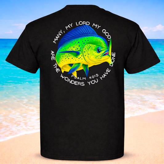 Black t-shirt with a colorful Mahi Mahi fish graphic and text on a beach background
